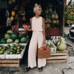 Ellie Bullen - Elsa's Wholesome Life - in fresh fruit market stall
