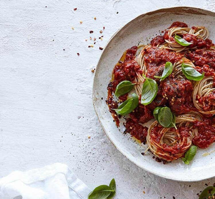 vegan spaghetti with tomato mushroom bolognese