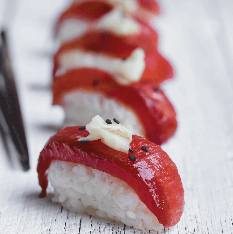 Image of watermelon sushi - from Great Vegan Meals for the Carnivorous Family: 75 Delicious Dishes for Herbivores, Carnivores and Everyone in Between by Amanda Logan