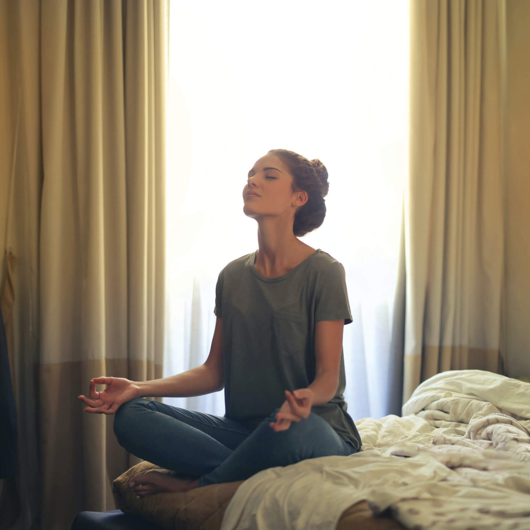 woman-meditating-in-bedroom-3772612