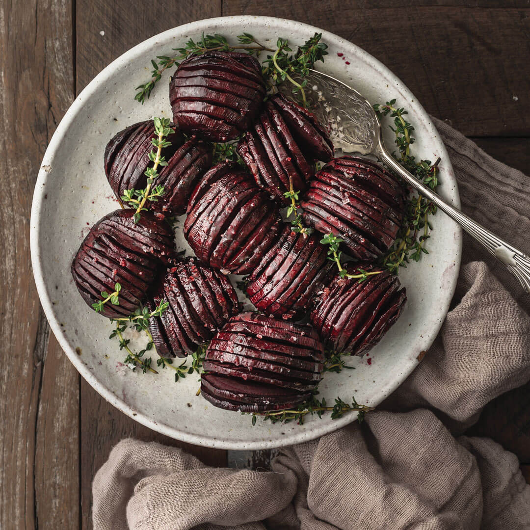Hasselback beetroot with thyme and maple