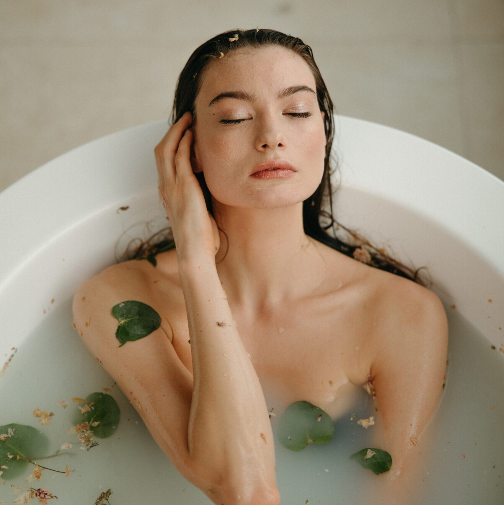 Woman enjoying bathhouse basking rituals at home